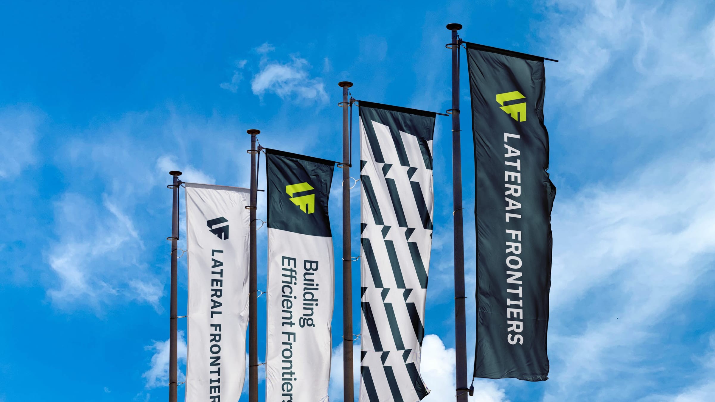 Lateral Frontiers flags against a blue sky